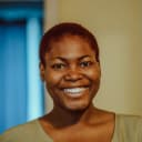 Portrait of a smiling Nigerian student.